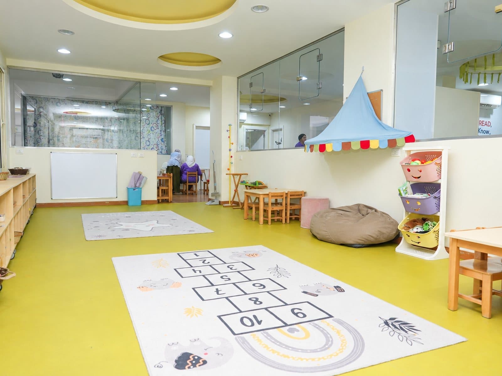 The main room with number and hopscotch floor mats